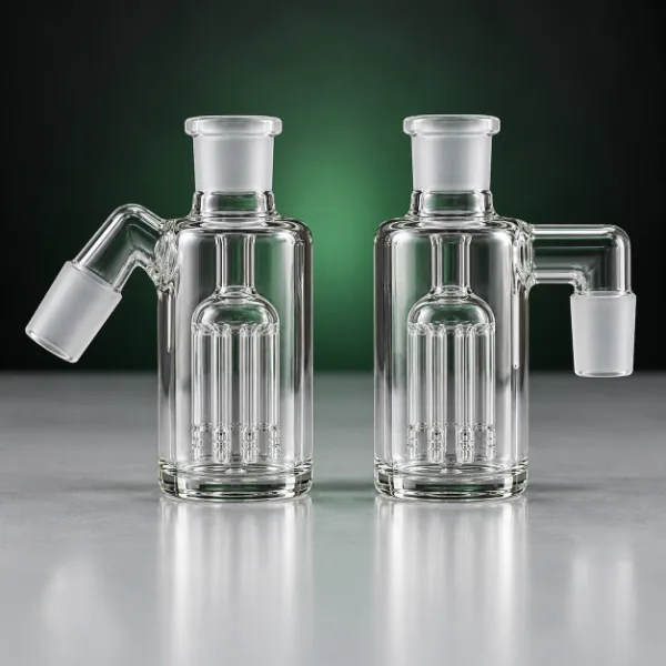 Two glass ash catchers side by side, one with a 45 degree joint and one with a 90 degree joint