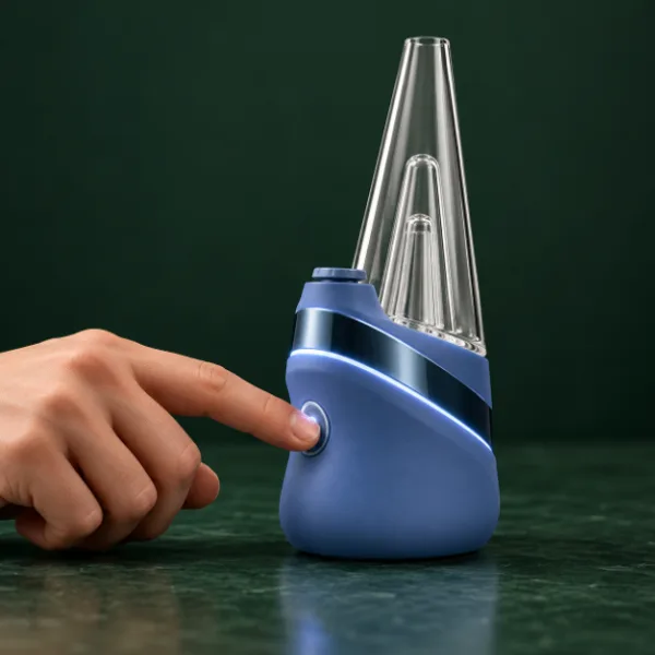 Pressing the button on a Puffco New Peak e-rig