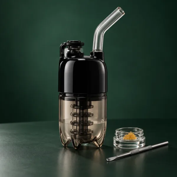 Lookah Dragon Egg e-rig beside a concentrate dish and loading tool