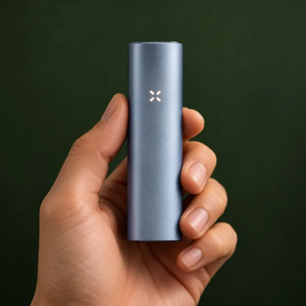 Holding a PAX Flow with its light glowing